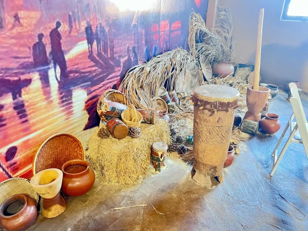 Drums, thatch and clay pots in the cultural display