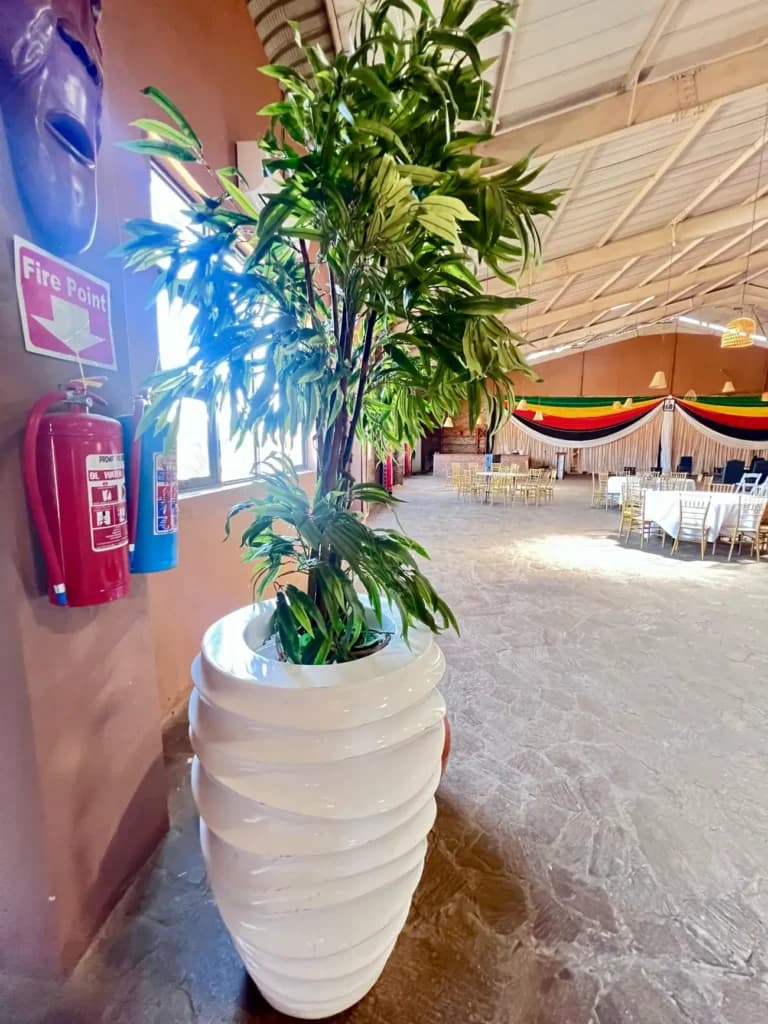 The hall set for a function, with flag draping